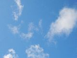 White Clouds preview - click on the image to get the large photo of white clouds on a blue sky